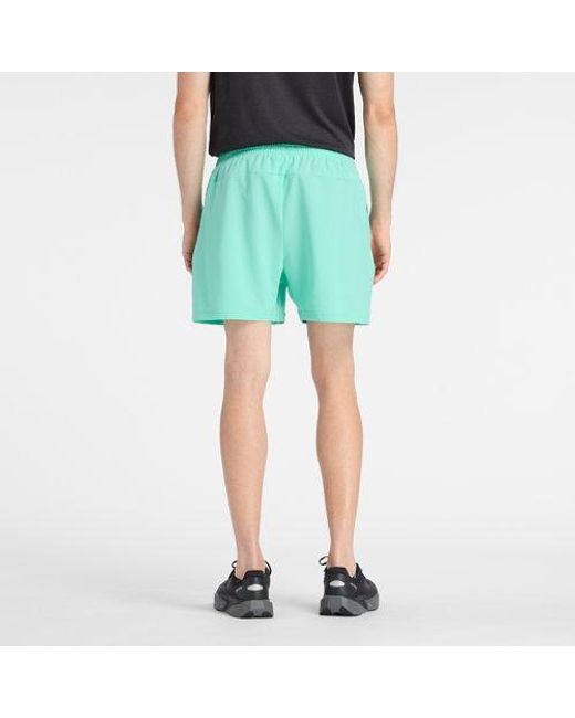 New Balance Green Sport Essential Short 5" for men