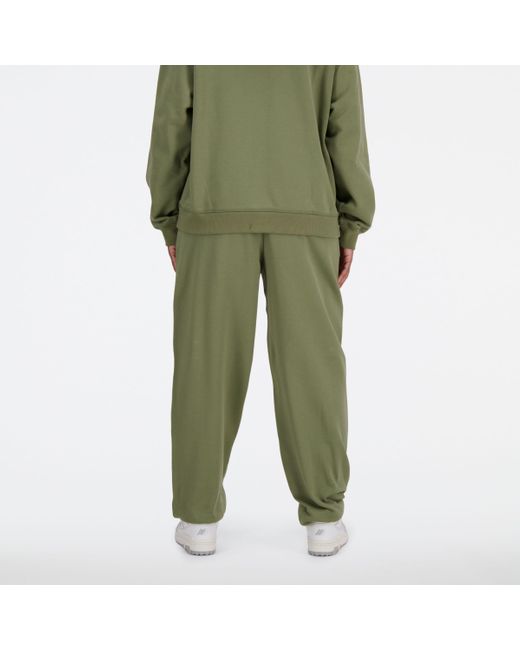 Athletics french terry jogger in verde di New Balance in Green