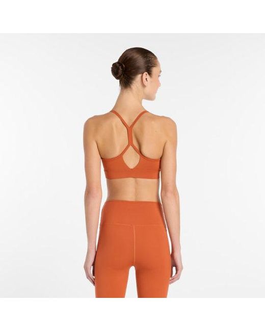 New Balance Orange Nb Essential Yoga Bra