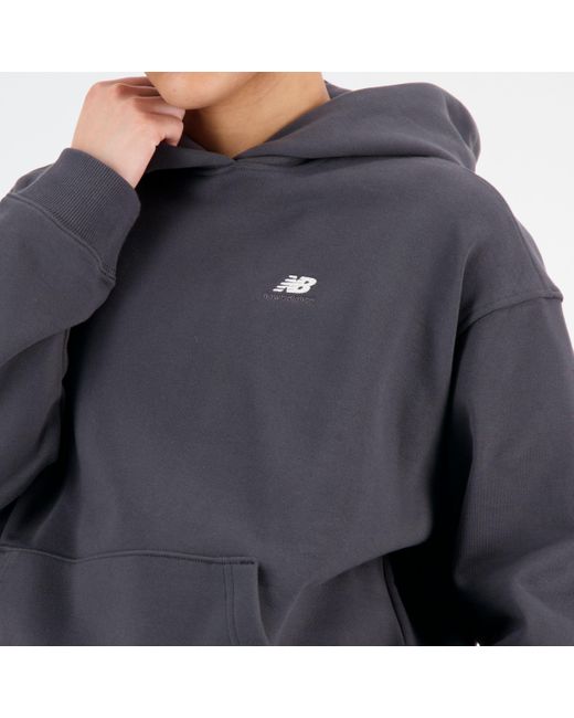 New Balance Blue Sport essentials premium fleece hoodie in schwarz
