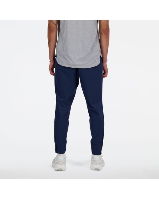 New Balance Tenacity Stretch Woven Pant In Blue Polywoven for men