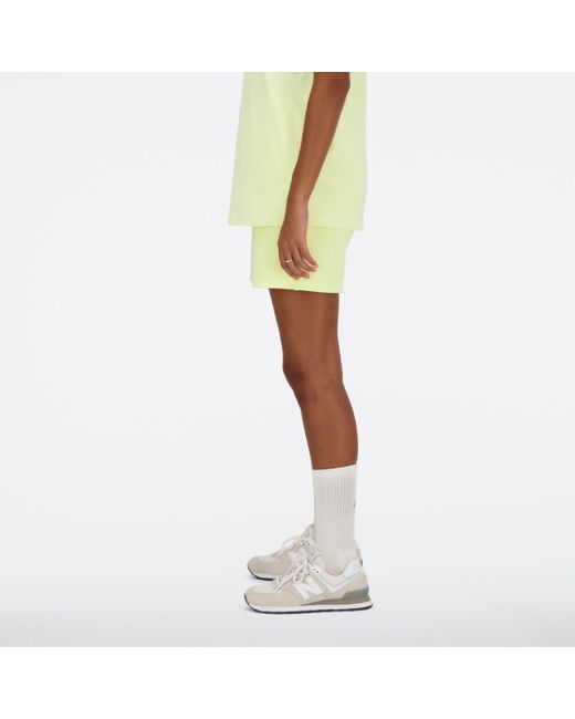 Athletics french terry short in verde di New Balance in Yellow