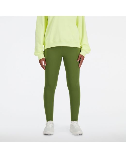 Nb sleek high rise sport legging 25" in verde di New Balance in Green