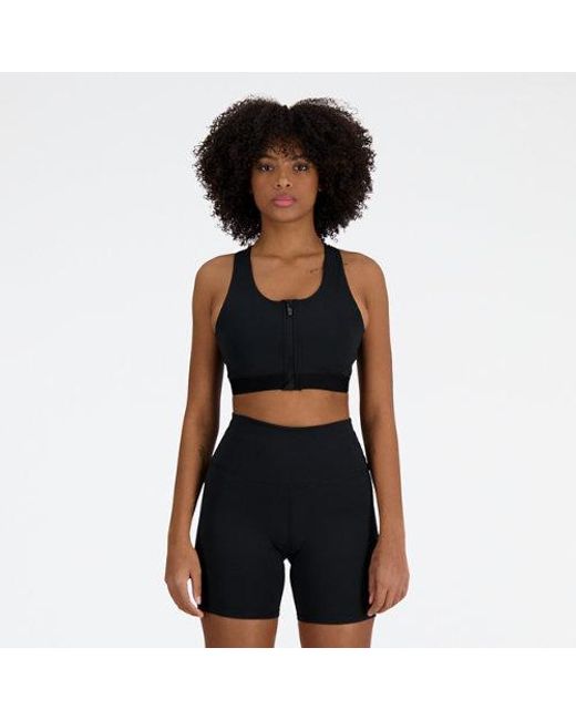 Femme Nb Sleek Medium Support Pocket Zip Front Bra En, Poly Knit, Taille New Balance en coloris Black