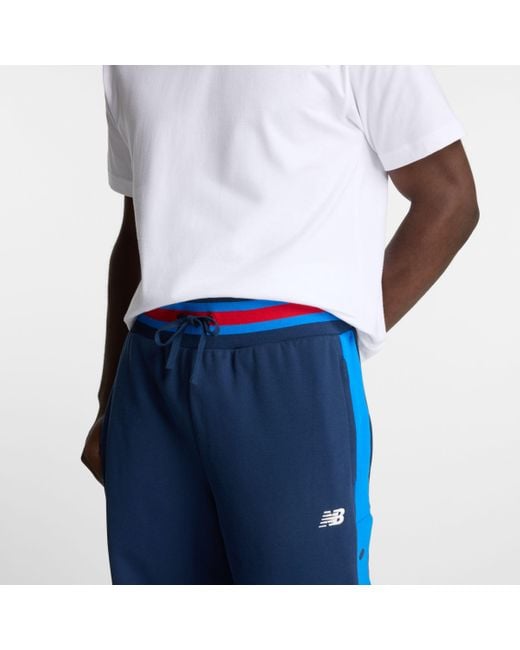 New Balance Sportswear's Greatest Hits Snap Pant In Blue Poly Knit for men