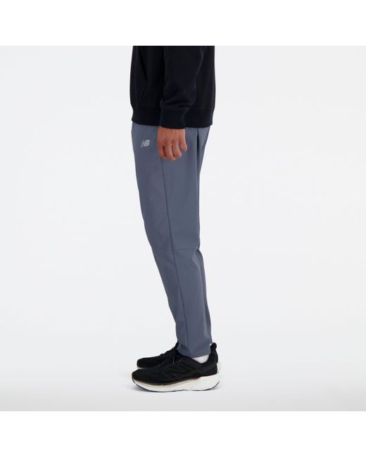 New Balance Blue Ac Tapered Pant 29" In Polywoven for men
