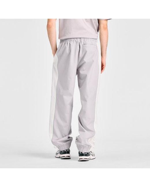 New Balance Gray Trackside Woven Pant for men