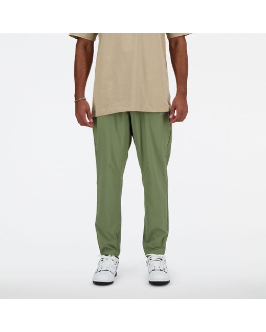 New Balance Ac Tapered Pant 29" In Green Polywoven for men