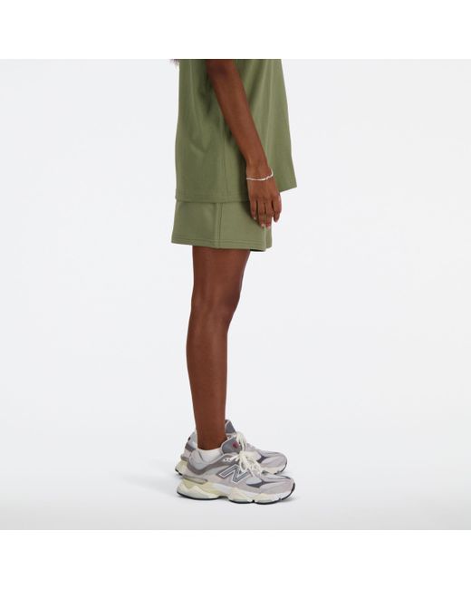 Athletics french terry short in verde di New Balance in Green