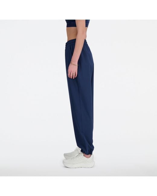 New Balance Athletics Stretch Woven jogger In Blue Poly Knit