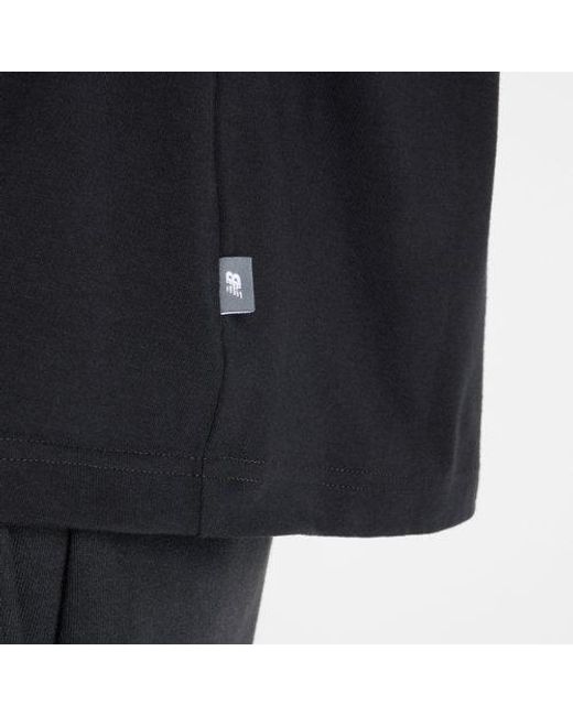 Donna Linear Heritage Oversized T-Shirt di New Balance in Black