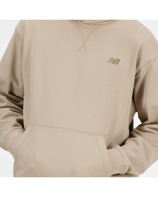 Athletics french terry hoodie di New Balance in Natural da Uomo