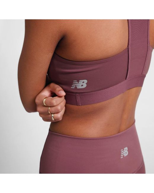 New Balance Purple Nb Sleek Medium Support Pocket Sports Bra In Brown Poly Knit