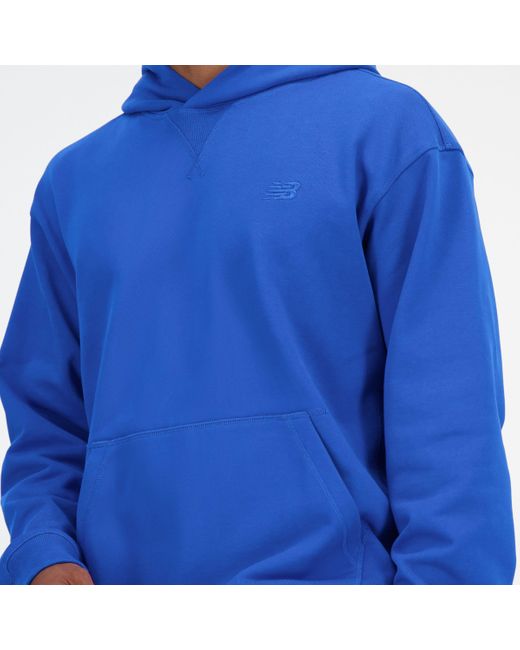 New Balance Athletics french terry hoodie in blau in Blue für Herren