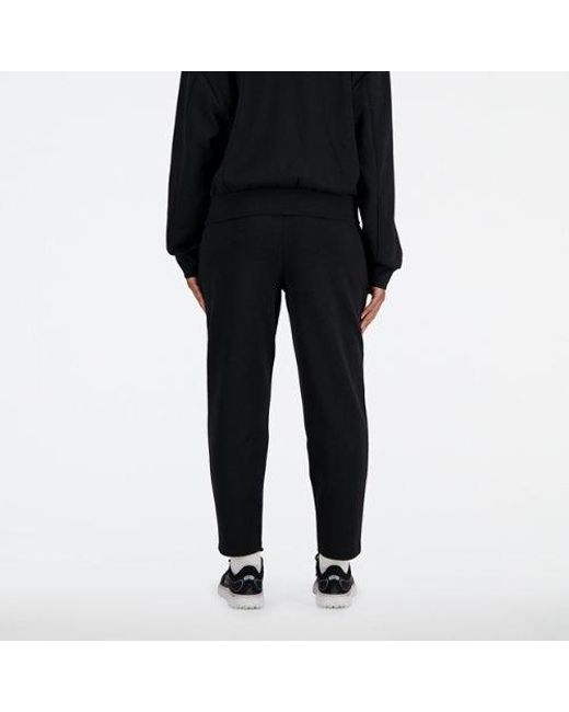 New Balance Tech Knit Pant In Black Poly Knit