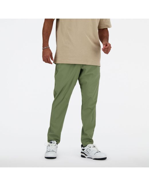 New Balance Ac Tapered Pant 29" In Green Polywoven for men