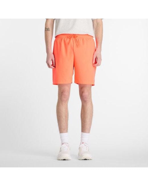 New Balance Orange Sport Essential Short 7" for men