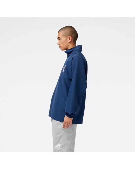 Sport seasonal woven jacket in blu di New Balance in Blue da Uomo