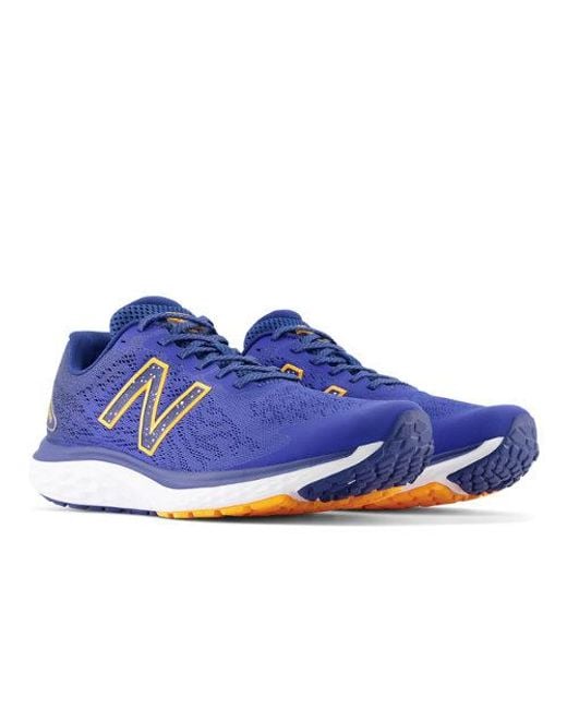 Fresh foam 680v7 in blu/arancia di New Balance in Blue da Uomo