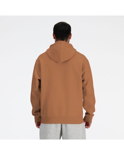 Sport essentials french terry hoodie in marrone di New Balance in Brown da Uomo