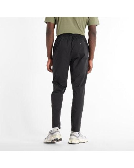 New Balance Black Athletic Standard Tapered Pants for men