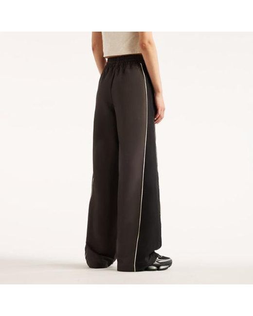 New Balance Black Trackside Woven Pant