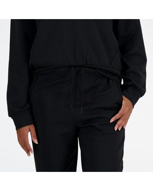 New Balance Tech Knit Pant In Black Poly Knit