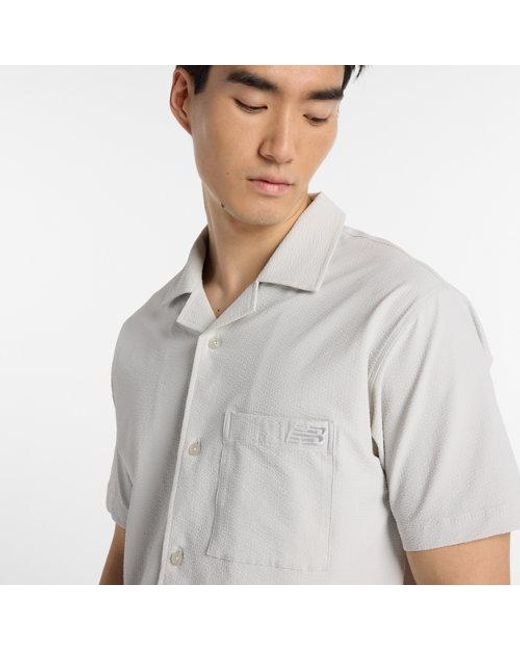 New Balance Herren Seersucker Button Up Short Sleeve in White für Herren