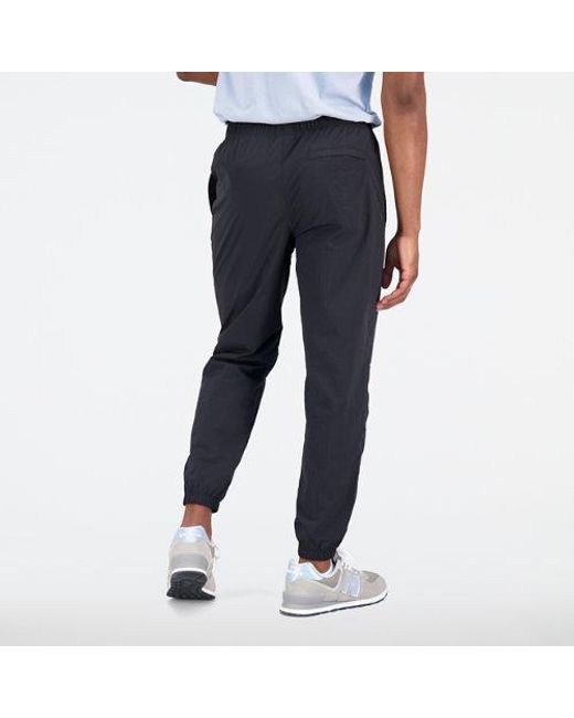 Pantalons Athletics Remastered Wind Pant New Balance pour homme en coloris Blue