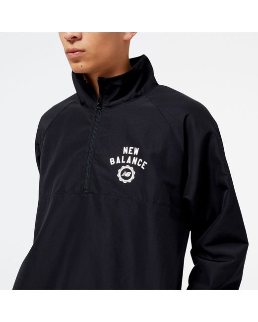 Sport seasonal woven jacket in nero di New Balance in Black da Uomo