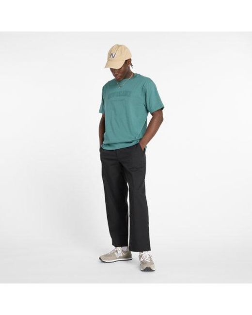 New Balance Herren Embossed Varsity Jersey T-Shirt in Green für Herren