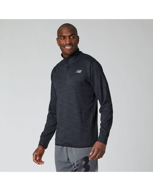 new balance tenacity hooded quarter zip