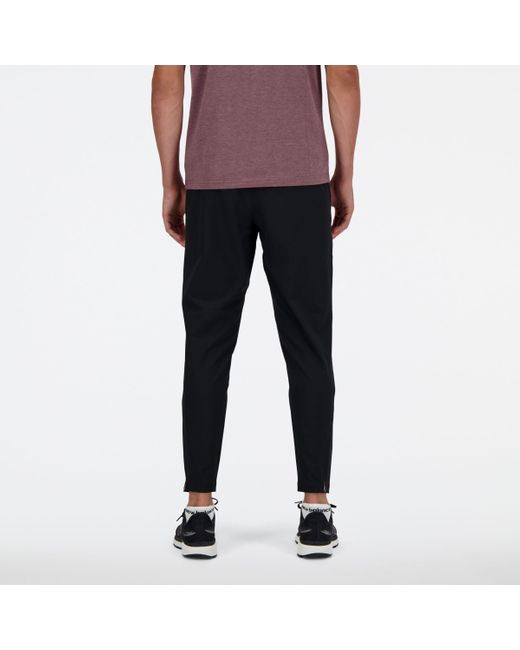 New Balance Tenacity Stretch Woven Pant In Black Polywoven for men