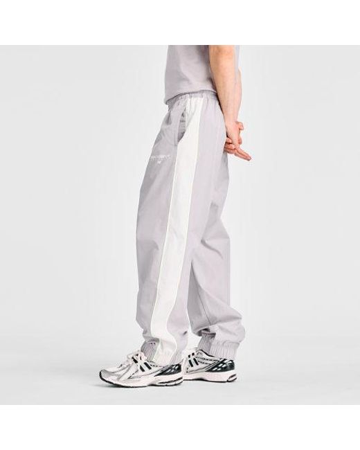 New Balance Gray Trackside Woven Pant for men
