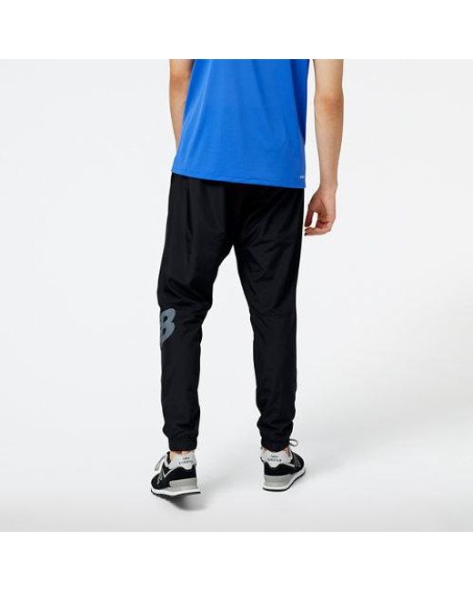 Homme Pantalons Tenacity Woven En, Polywoven, Taille New Balance pour homme en coloris Blue