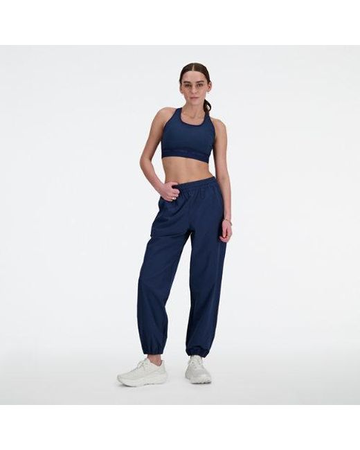 New Balance Athletics Stretch Woven Jogger in het Blue