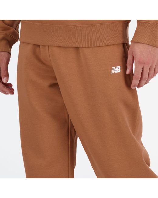 Sport essentials fleece jogger in marrone di New Balance in Brown da Uomo