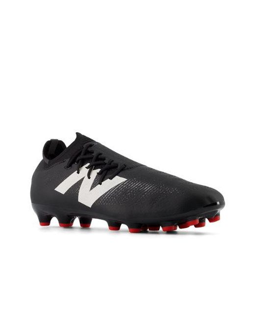 Furon pro ag v7+ in nero/bianca di New Balance in Black
