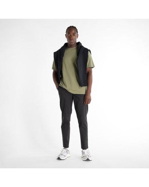 New Balance Black Athletic Standard Tapered Pants for men