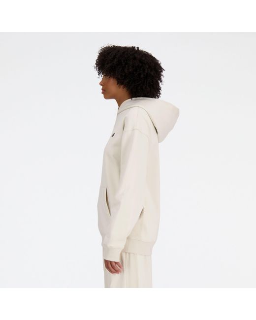 Sydney's signature collection x nb french terry hoodie di New Balance in Natural