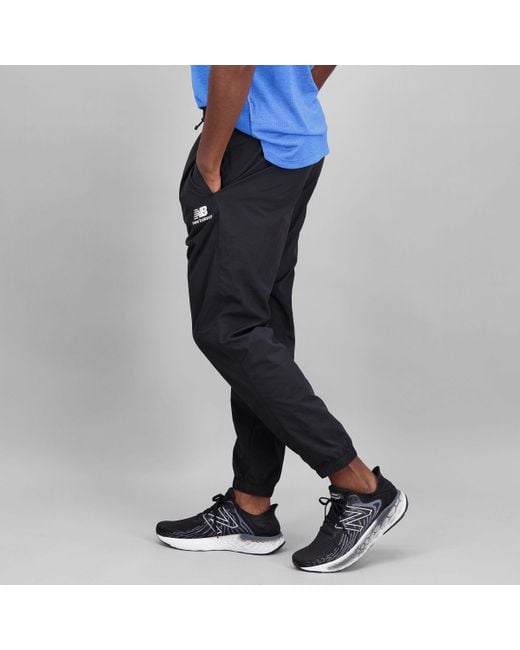 New Balance Synthetic Nb Athletics Higher Learning Wind Trousers in Black  for Men | Lyst