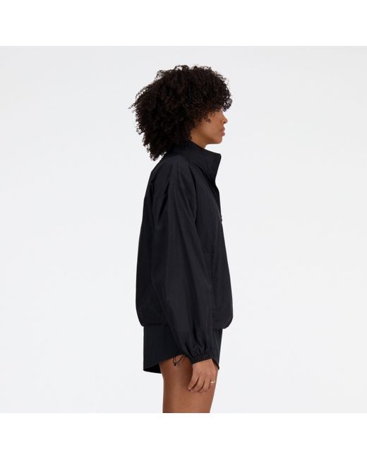 Athletics packable jacket in nero di New Balance in Black