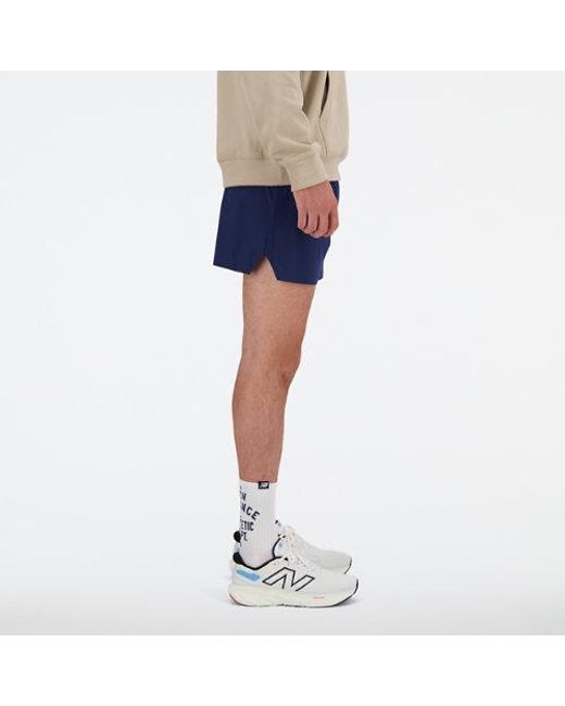 New Balance Blue 's Sports Essentials Shorts 5 Inch for men