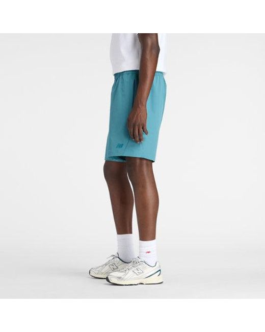 New Balance Blue Athletics Stretch Woven Short 7" for men