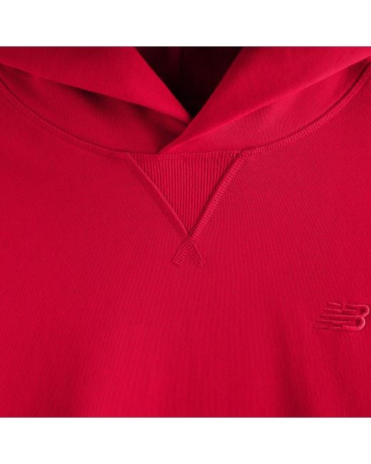 New Balance Athletics french terry hoodie in rot in Red für Herren