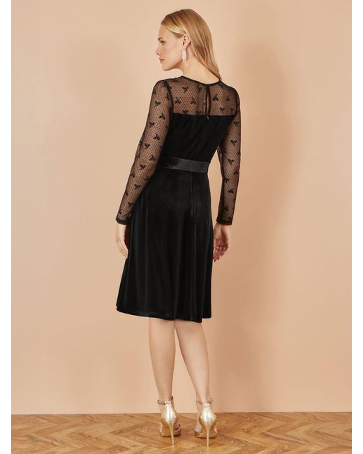 Yumi' Velvet Skater Dress With Mesh Bow Sleeves in Black | Lyst Yumi' Velvet Skater Dress With Mesh Bow Sleeves in Black | Lyst