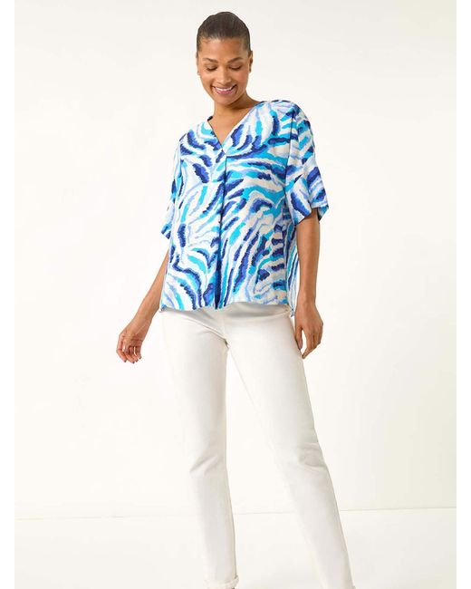 Roman Blue Animal Print Pleated Tunic Top