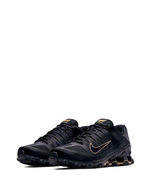 Nike Schwarz/Gold in Black für Herren
