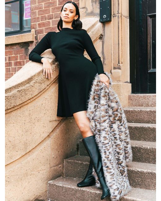 Roman Women's Black Ribbed Skater Sweater Dress - www.disolcolor.com Roman Women's Black Ribbed Skater Sweater Dress - www.disolcolor.com