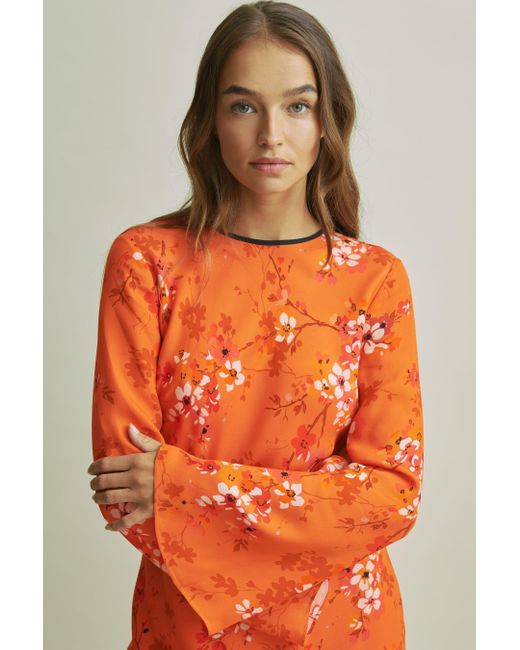 Florere Orange Flute Sleeve Midi Dress